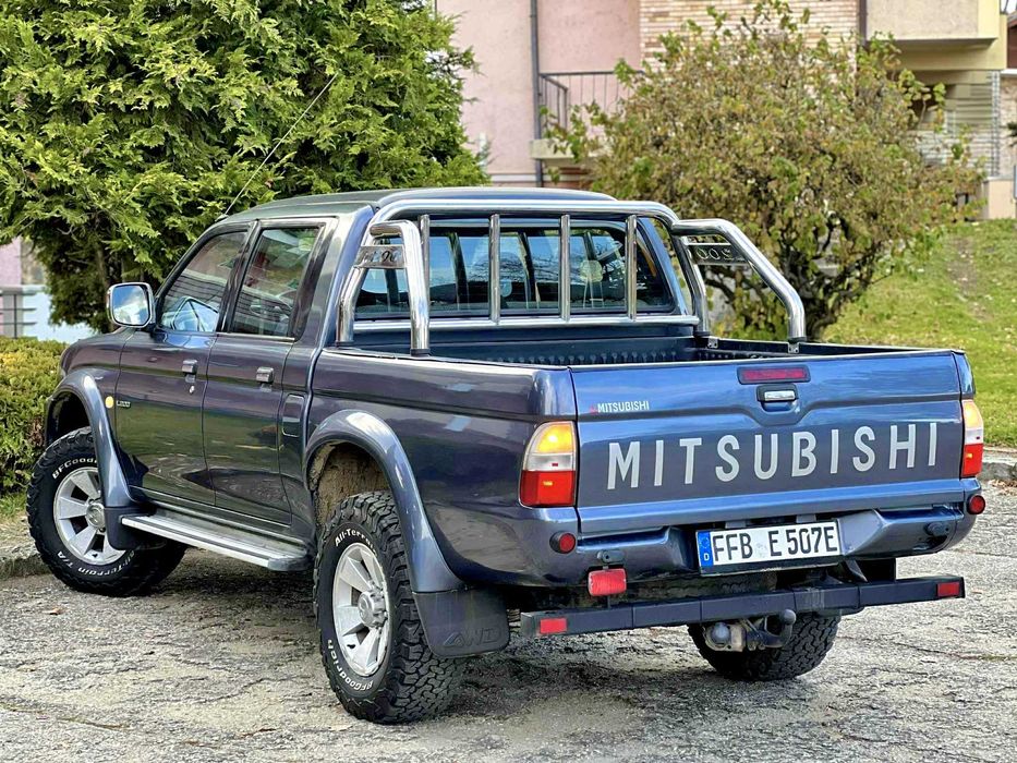 - IMPECABIL Mitsubishi L200 2.5Di-D133cp DAKAR EDITION Full