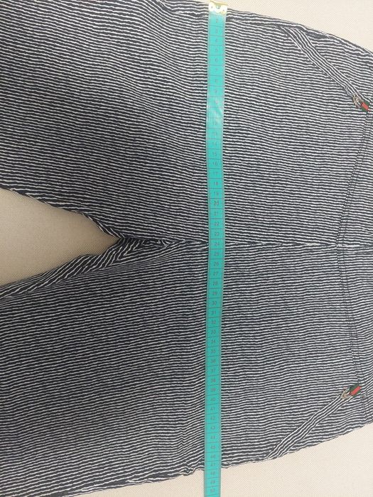 Pantaloni trei sferturi