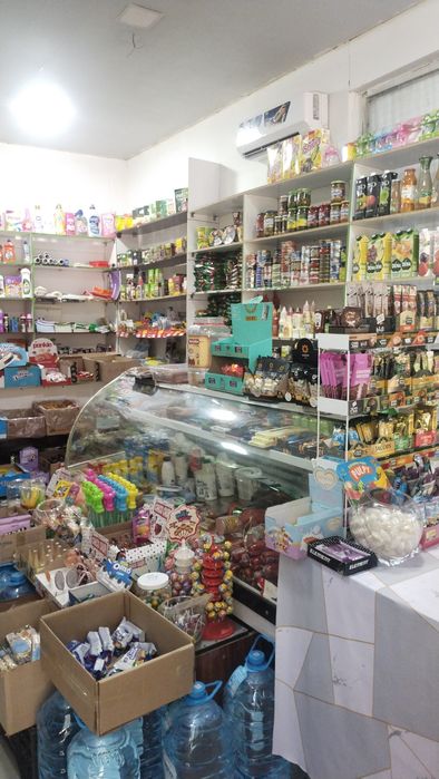 Таййор магазин прадухтаси билан