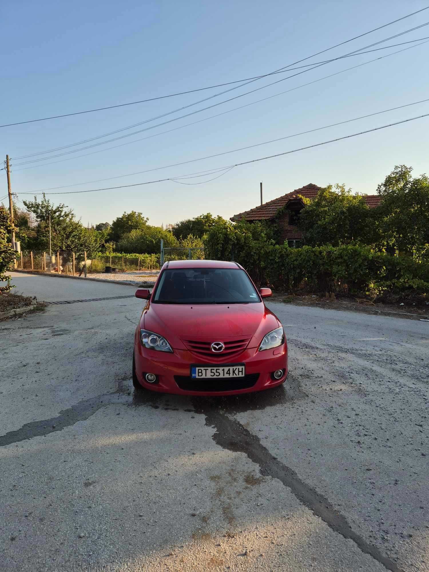 Mazda 3 (бензин - газ)