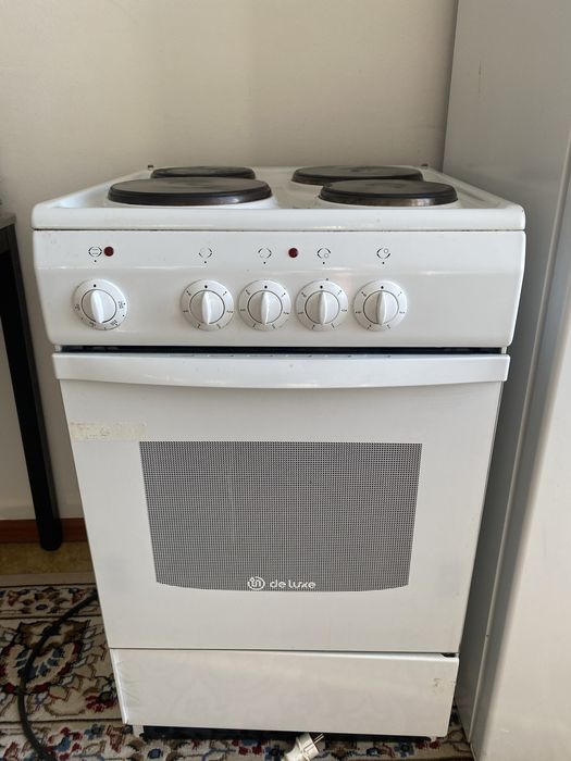 газовая плита Delux
