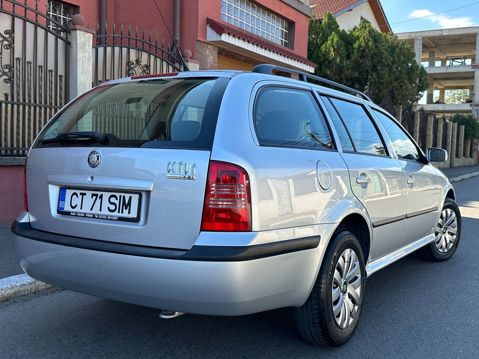 Skoda Octavia / Ambiente/ 1.6i 102Cp /AC/ Scaune incalzite/ ACTE LA ZI