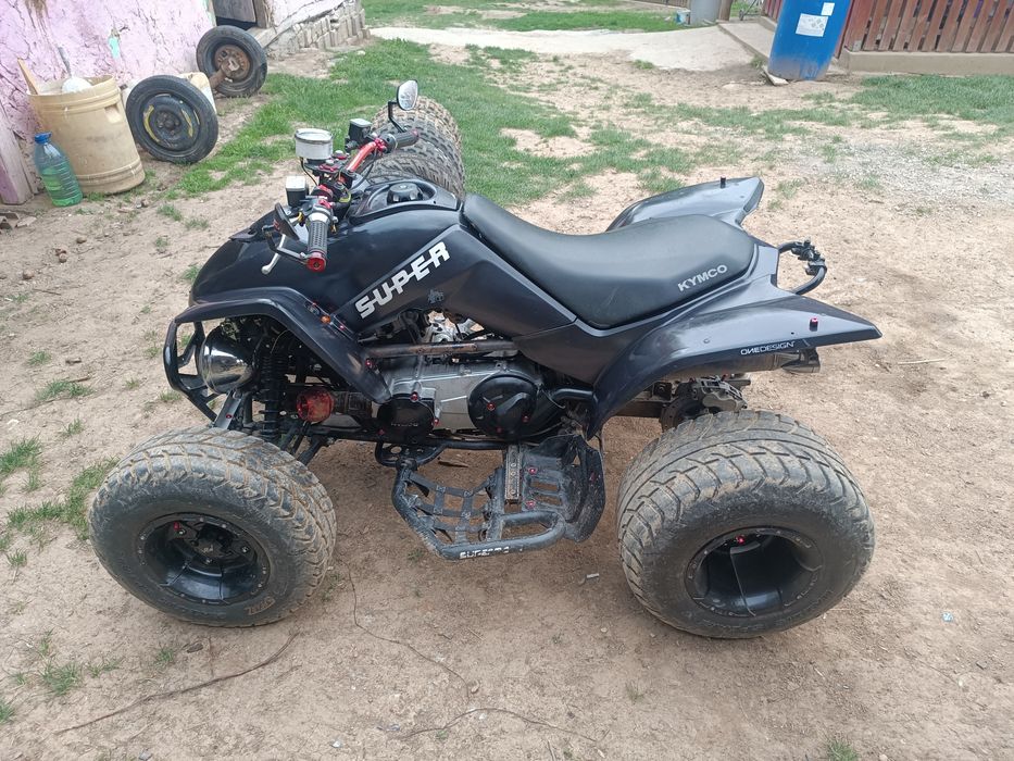 Vând ATV KYMCO DE 300cc ,și cu roți de schimb