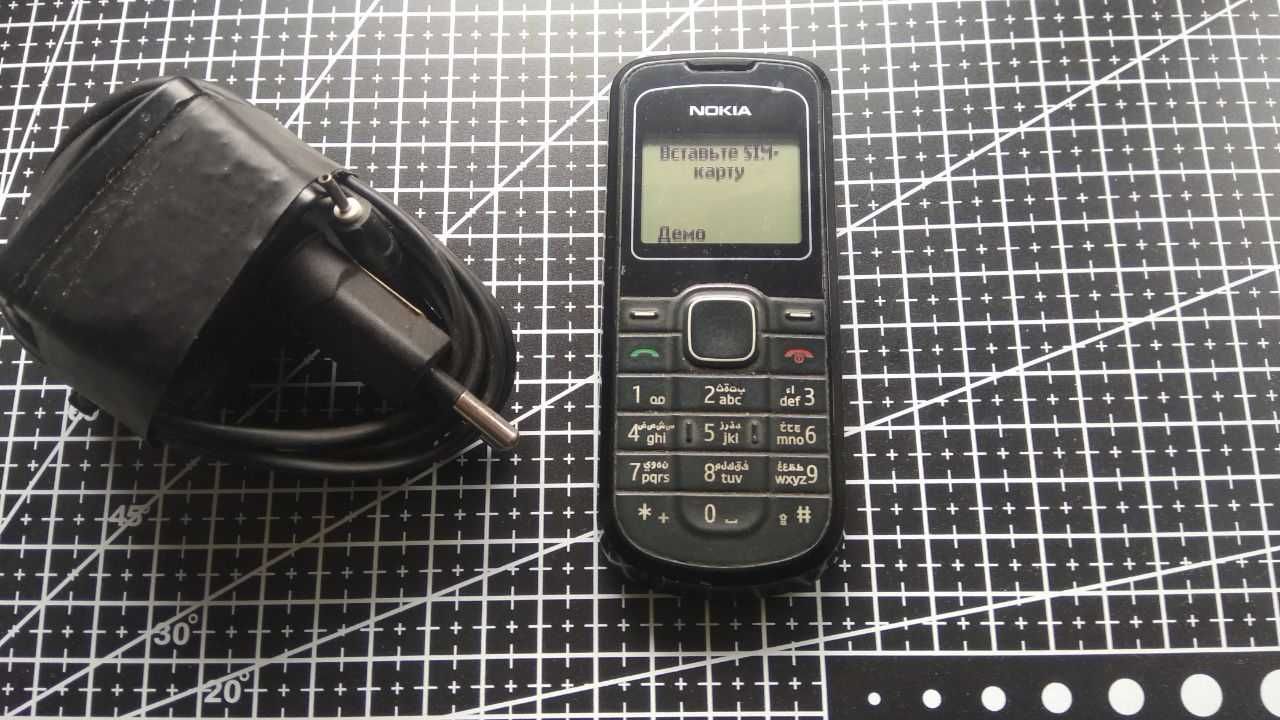 Телефон Nokia 1202-2.Регистрация IMEI есть.