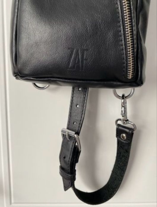 Продам оригинал кожанную барсетку бренда “ZAF” за 10000тг