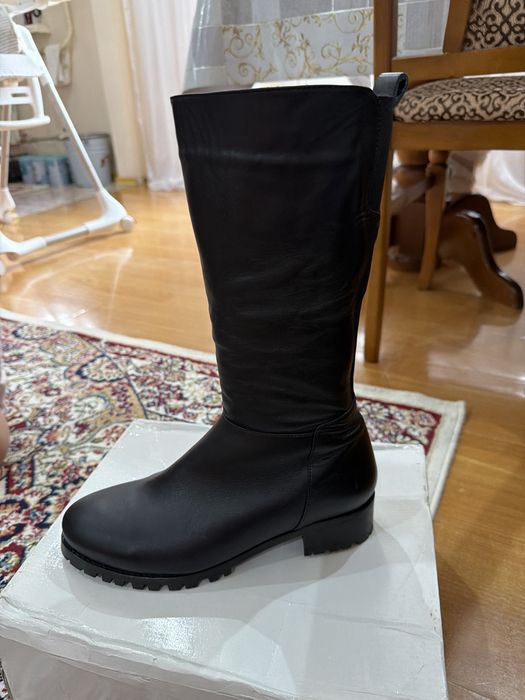 Продам сапоги новые