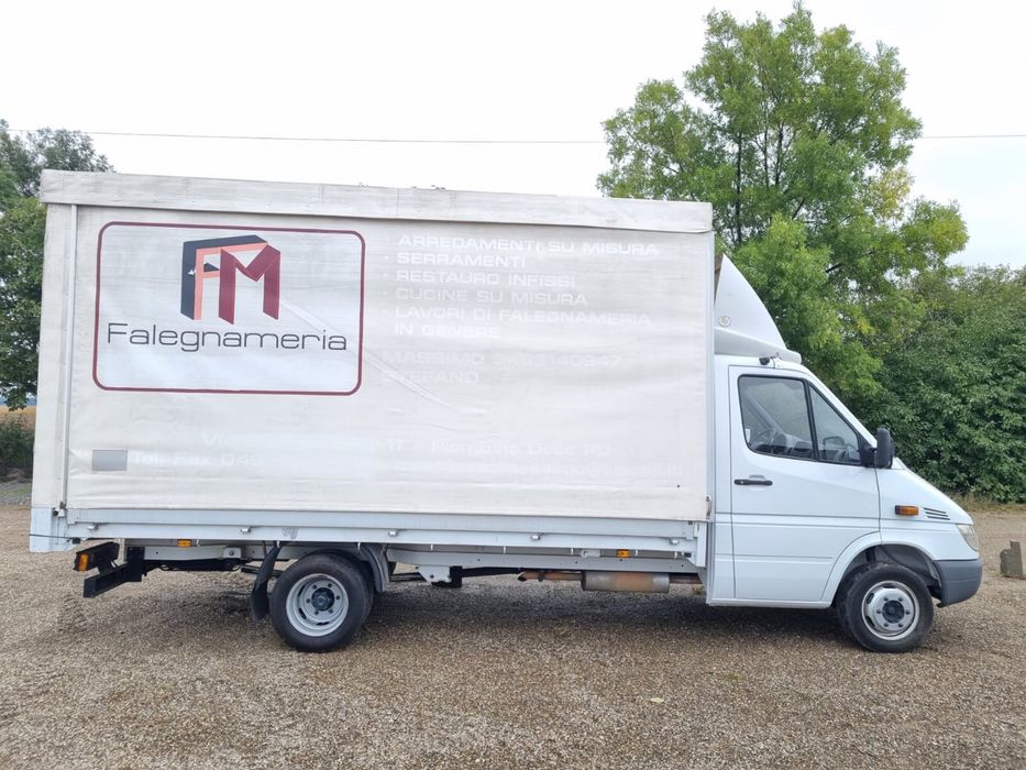Mercedes sprinter 416 cu bena ficsa cu prelata care se inalta .