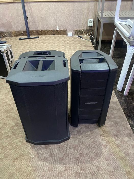 Boxe Bose sistem F1 folosite în restaurant cu huse .2 bași și 2 topuri