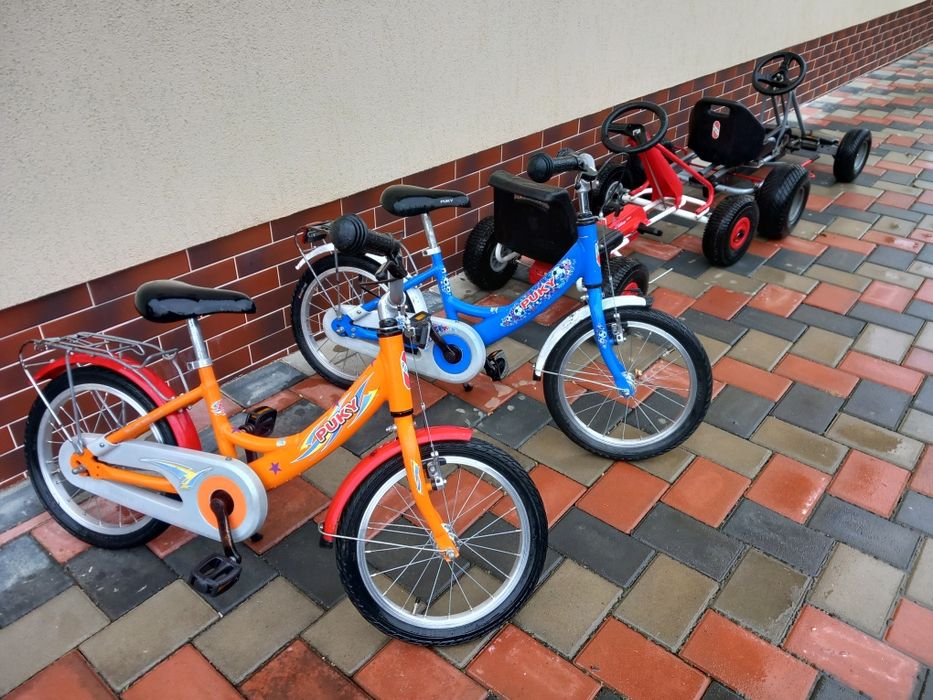 Biciclete, copii și cart copii