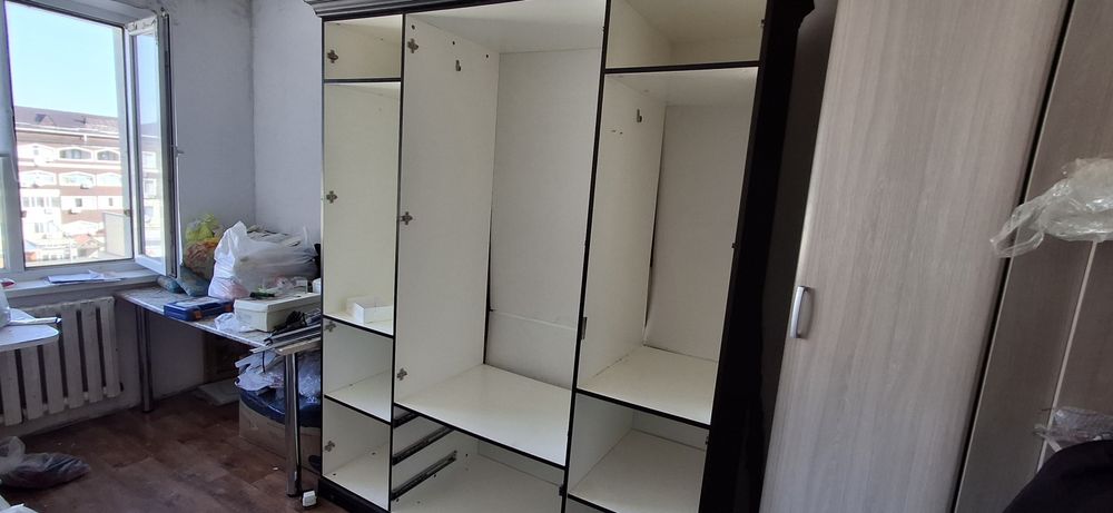 Шкаф 70000 тг, каспийде 388 мың