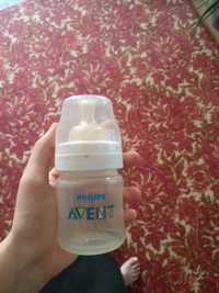 детская бутылочка для кормления и питьевая
