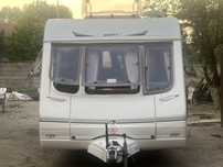 Caravana swift din anul 2002 de 2-3 persoane. Pret in euro 3850€