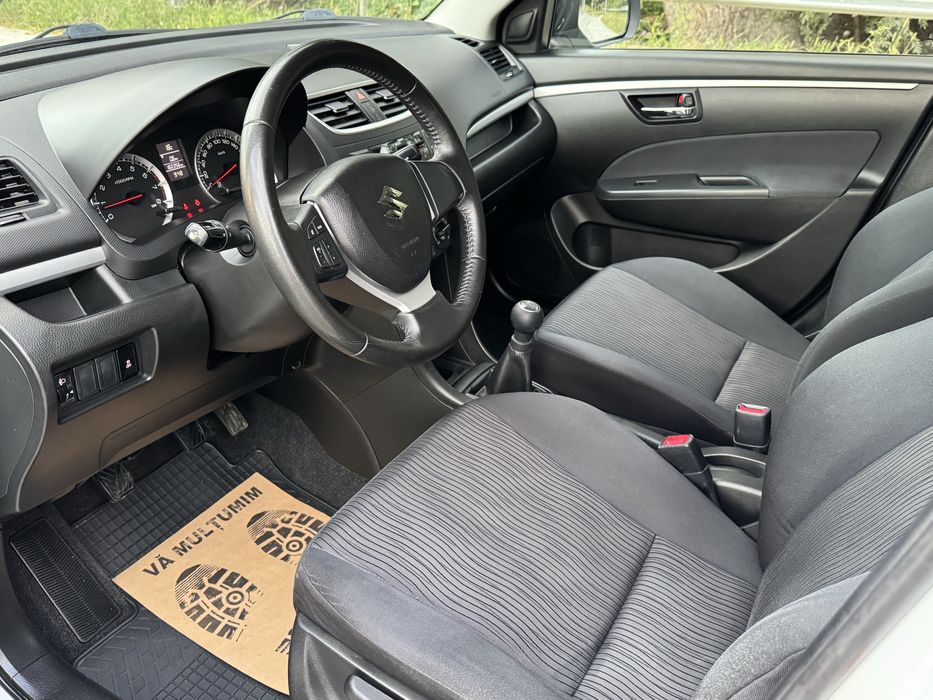 Suzuki Swift 4x4 - 2012 - 1.3 benzina - Alb perlat / Klima