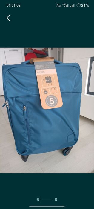 Vând troler material textil,dimensiune de 55 cm,nou, produs calitate.