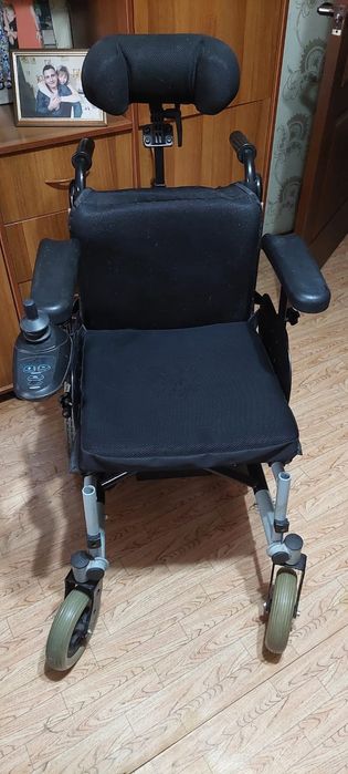 Электрическая инвалидная коляска