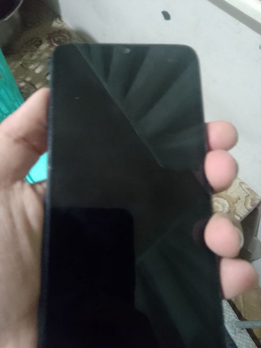 Infinix smart 6  holati yaxshi usta kurmagan  aloqa uchun telegram dan
