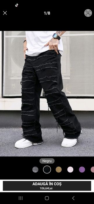 Vând blugi negri noi