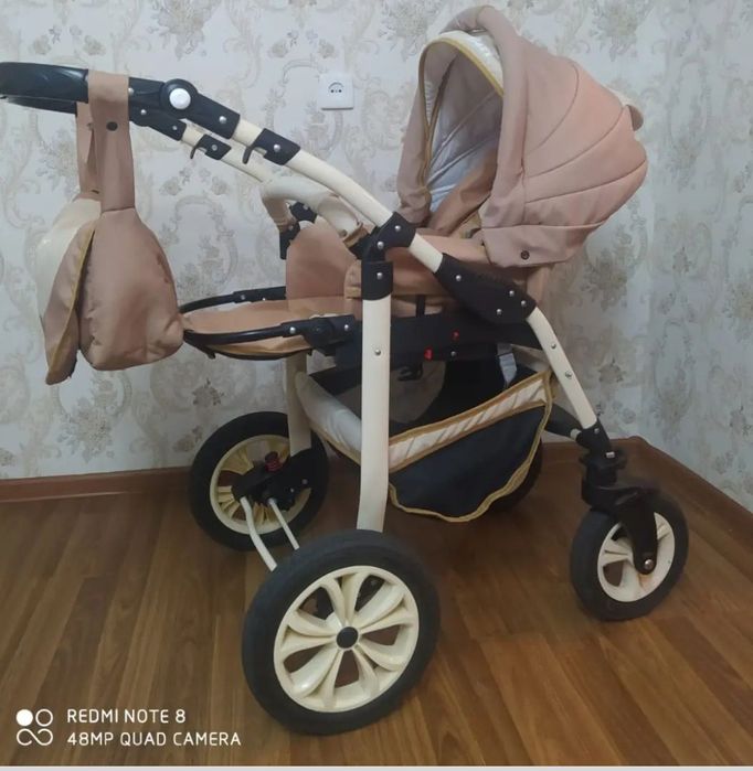 Коляска в идеальном состоянии.