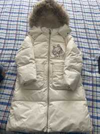 Продам  зимнюю куртку на девочку 134 размер