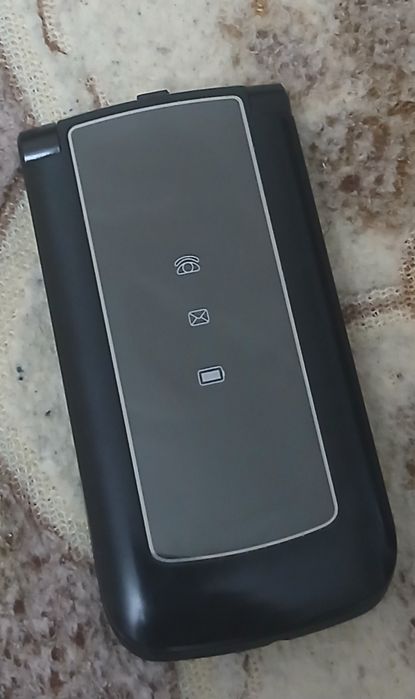 Продам Раскладгой Телефон  2 Сим карты