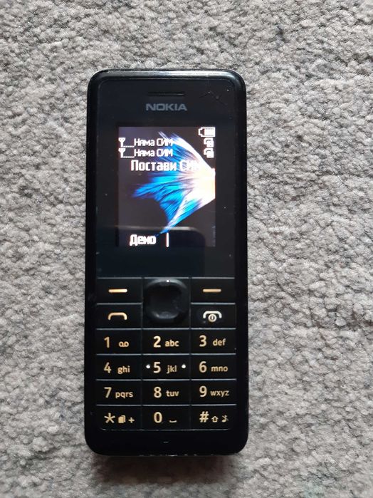 Мобилен телефон NOKIA 107, със зарядно у-во и слушалки