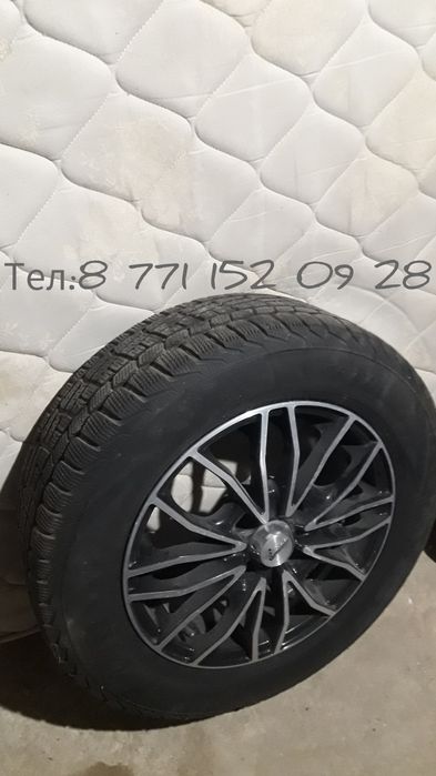 Колесо в сборе новая