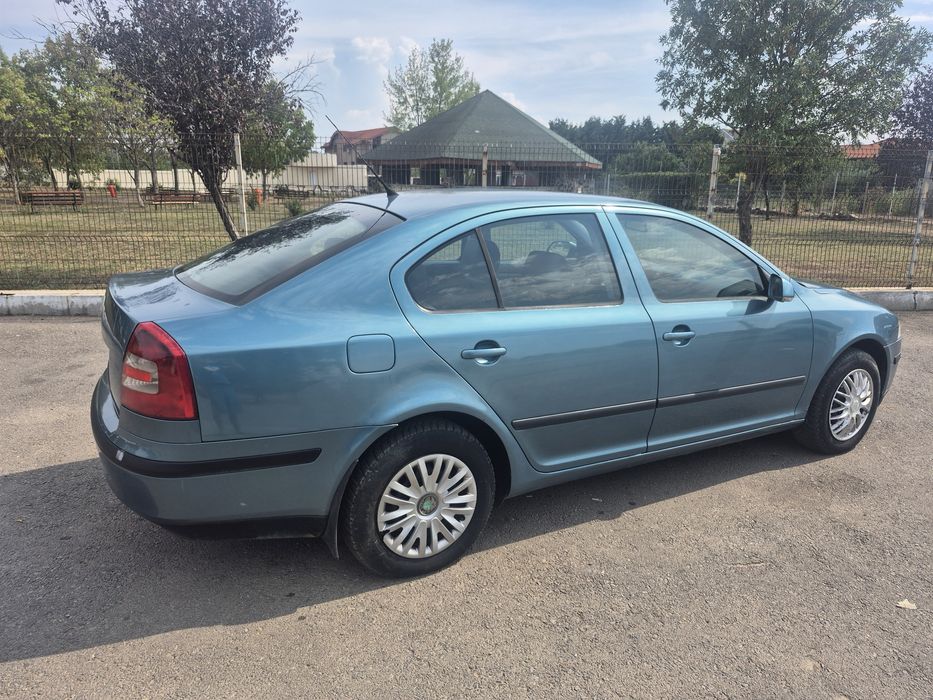 Skoda octavia 2  schimb cu Transporter T5