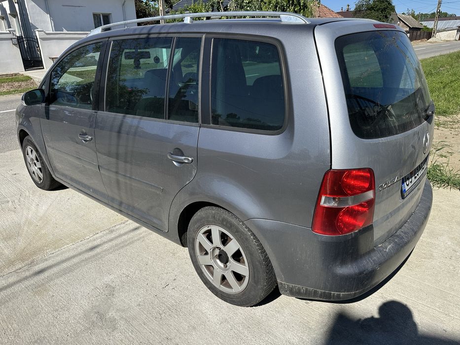 Usi Vw Touran 7 Locuri