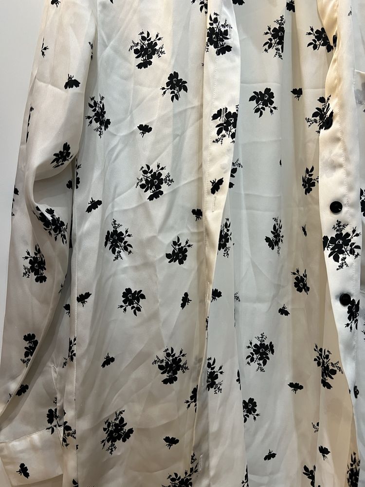 Риза Zara.