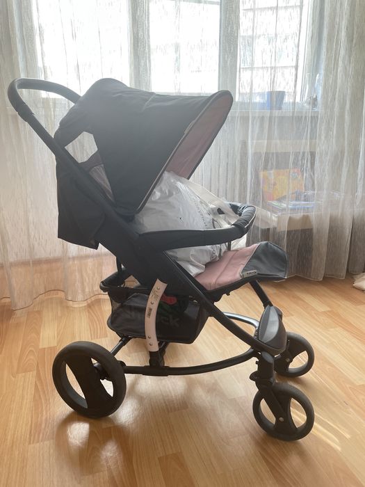 Детская коляска и зимний пуховый мешок