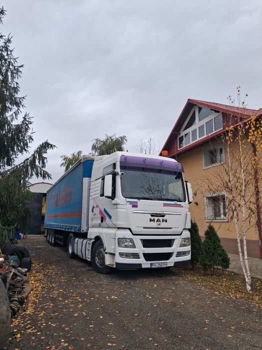 MAN TGX 18.440+semiremorca schmitz