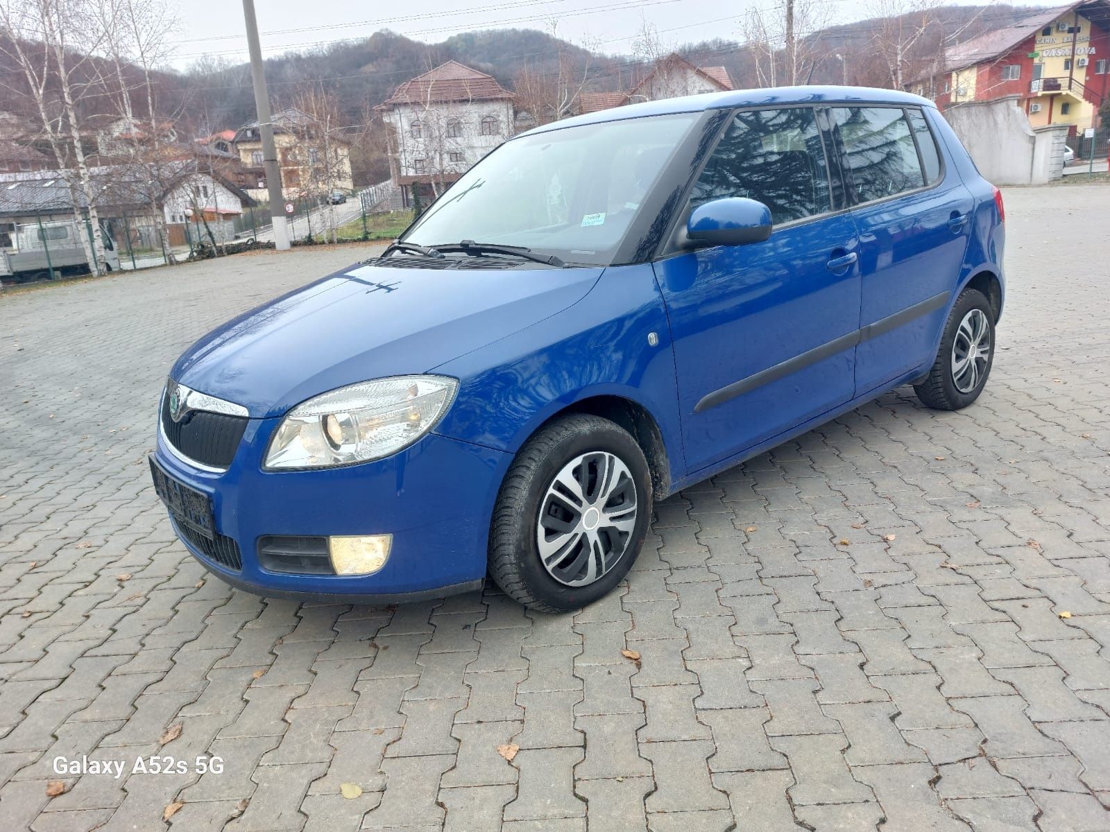 Skoda Fabia an 2010 este benzina 1,2 cm  climatronic fuctional .