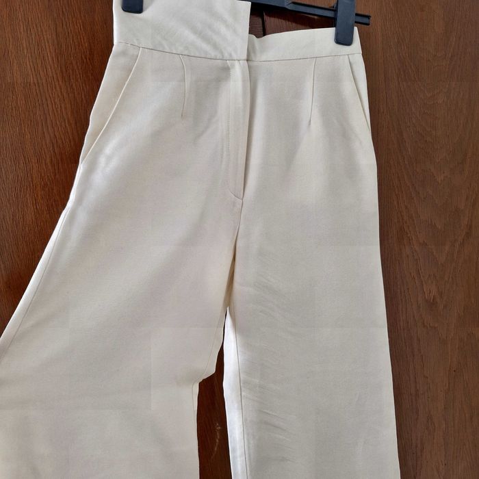 Pantaloni largi Sarcoline – design de creator, talie asimetrică