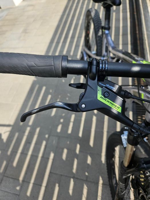 Vând bicicletă Rockrider ST900S cu GARANTIE