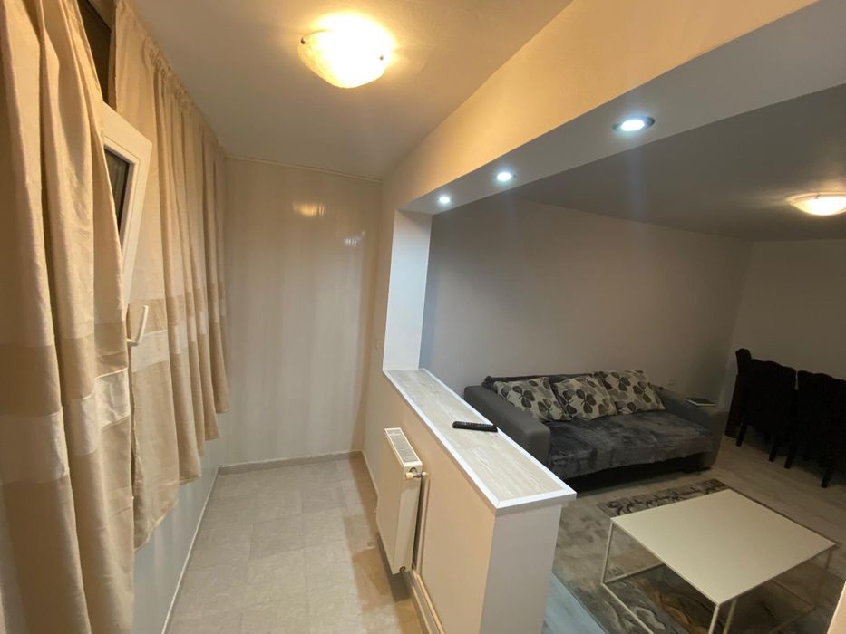 Vand apartament cu doua camere ,decomandat,54mp,izolat