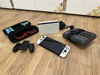 Vand schimb consolă Nintendo Switch OLED multiple accesorii Modată.