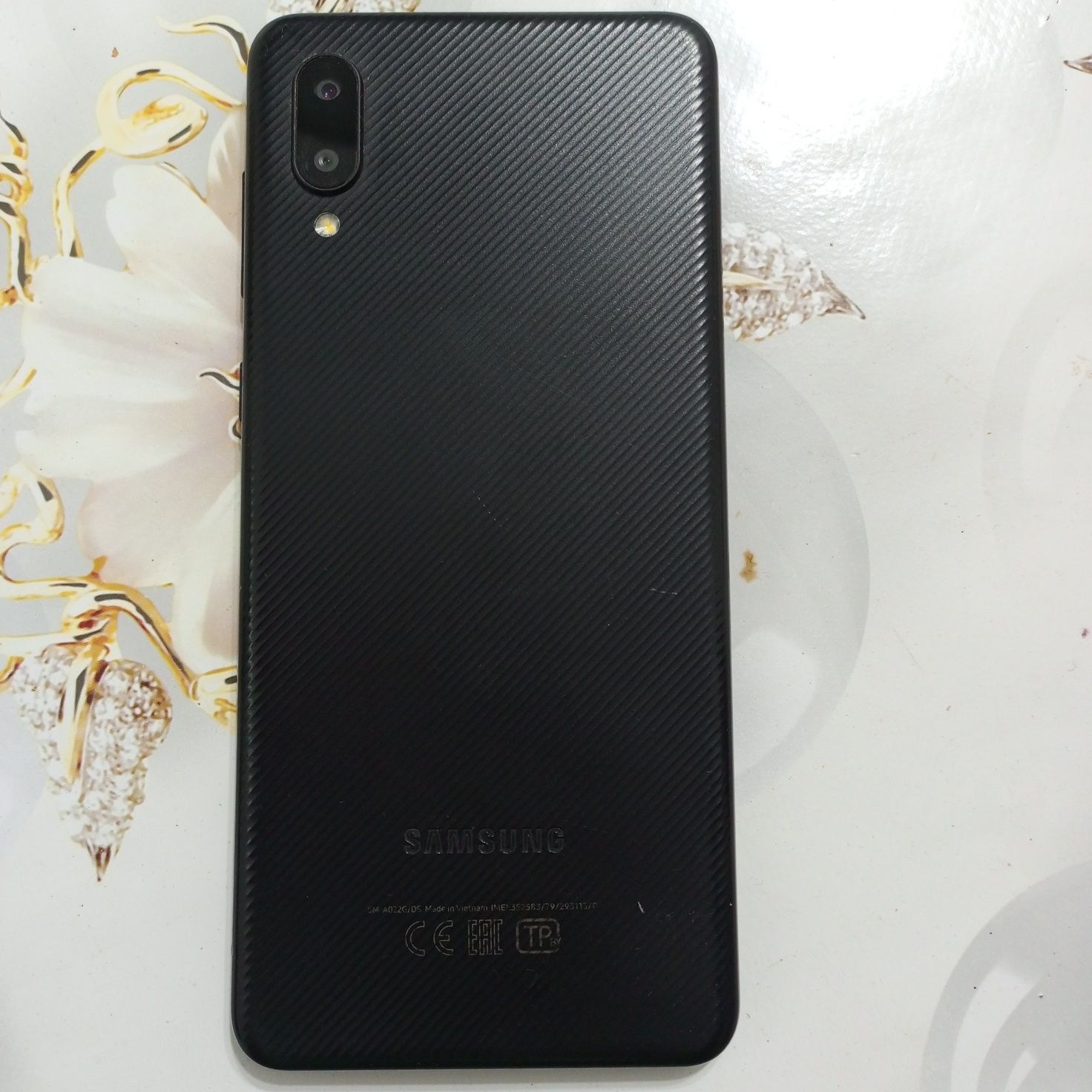 Телефон Samsung A02