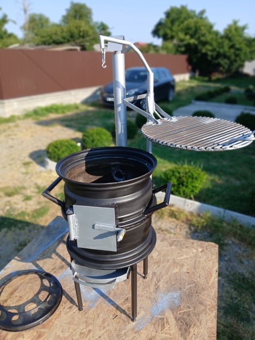 Gătește ca-n natură! Sobiță tip Godin cu grătar reglabil – 650 RON