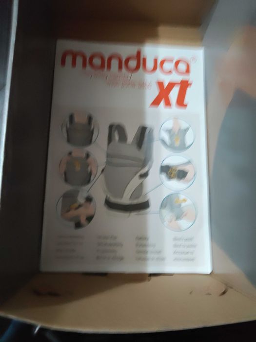 Vând marsupiu manduca xt nou