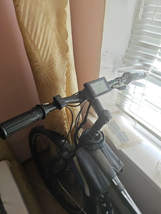 Электровелосипед,пробег на одном заряде 80 - 85 км. Передний привод .