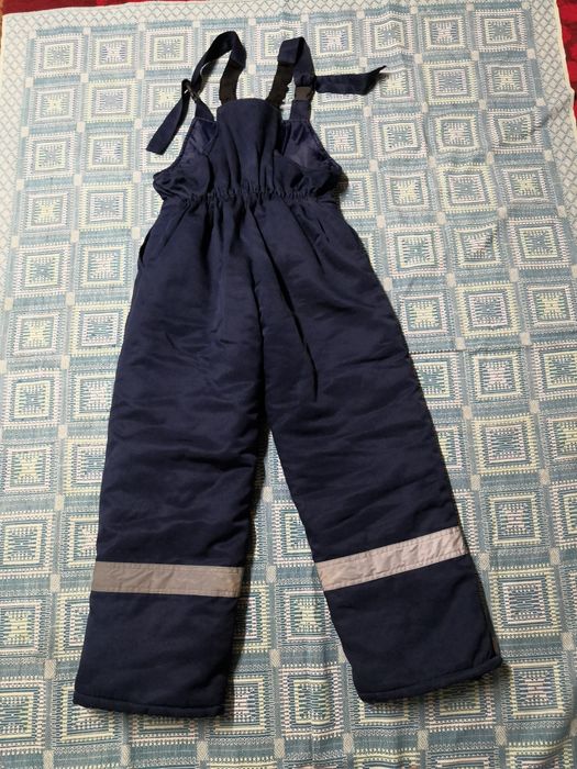 Продам новый зимний комбинезон