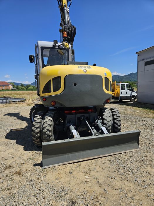 Excavator pe roti Neuson rototilt