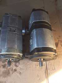Pompe hidraulice BOBCAT simple , duble si in trei sectiuni executam