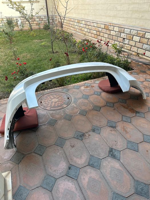 Продам новый задний бампер на L7.