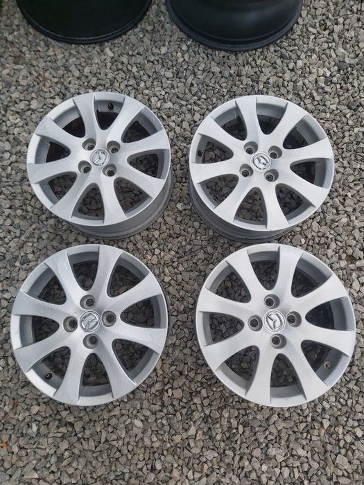 4x100..15.цола.6j ET45..оргинални Mazda