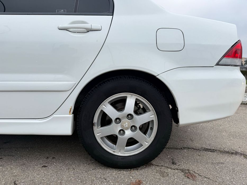 Mitsubishi Lancer 2008 – 1.6 benzină, proprietar unic