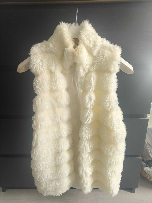 Дамски пухкав       елек