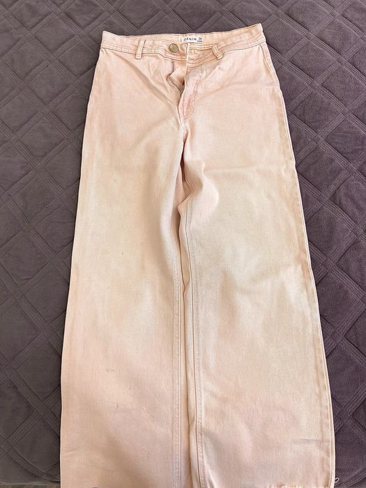 Нежно розовые джинсы