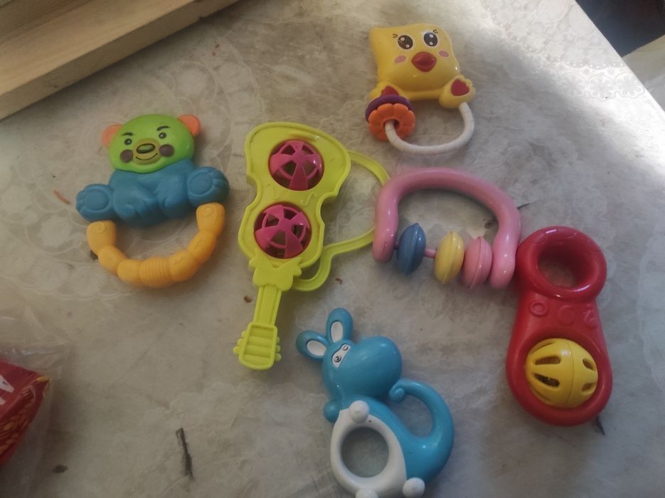 погремушки за шоколадку казахстанскую