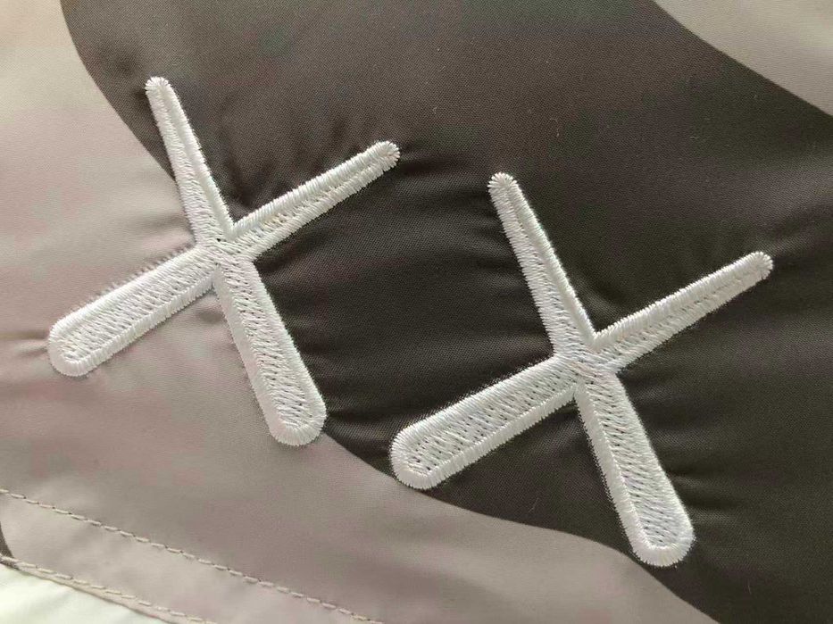 Geaca The North Face KAWS noua